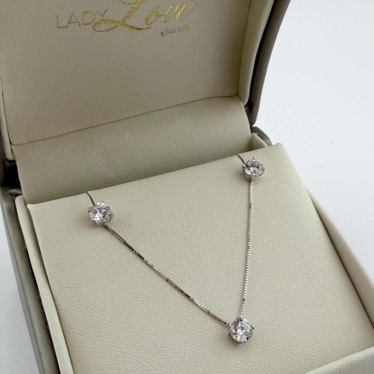 Set collana e orecchini Punto Luce - oro 18 kt
