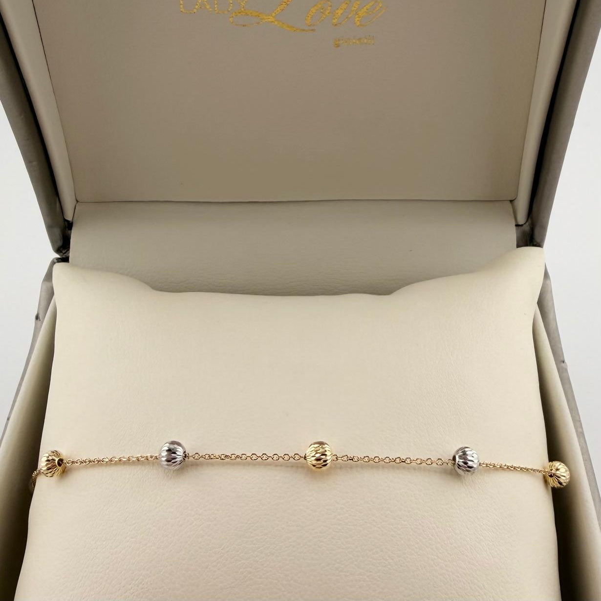 Bracciale con palline diamantate  - Oro 18 kt
