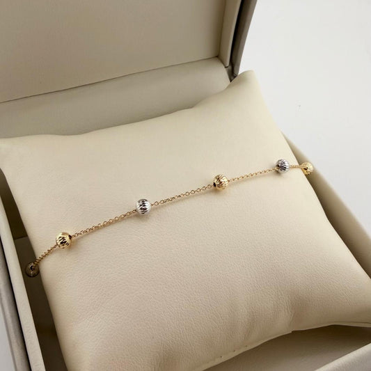 Bracciale con palline diamantate  - Oro 18 kt