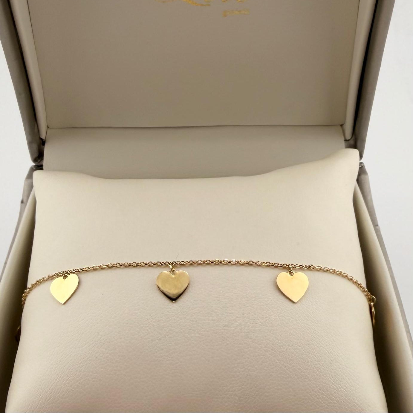 Bracciale con cuori pendenti - Oro 18 kt
