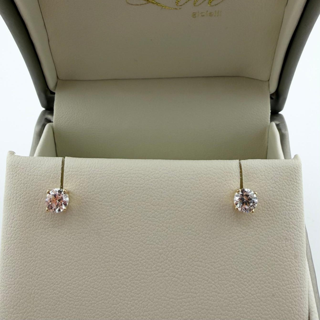 Orecchini punto luce con zirconi  - Oro 18kt