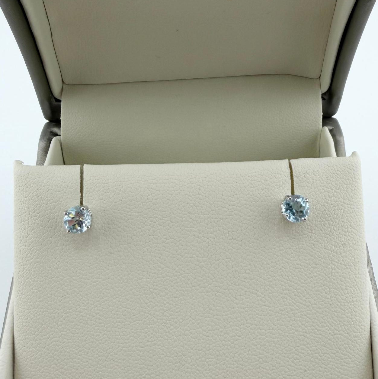 Orecchini punto luce con topazio azzurro naturale - Oro 18kt