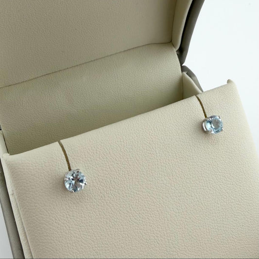 Orecchini punto luce con topazio azzurro naturale - Oro 18kt