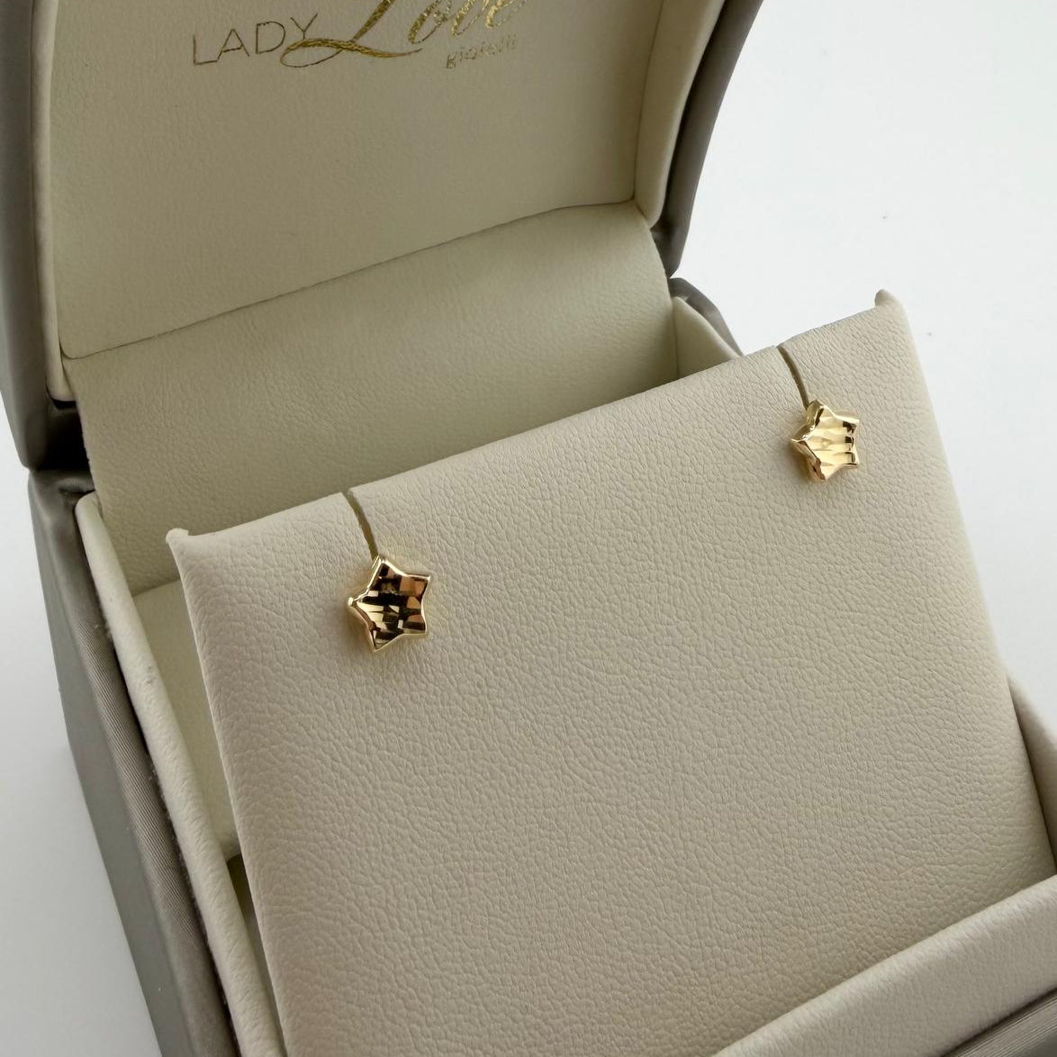 Orecchini a lobo a forma di stella sfaccettata  - Oro 18 kt