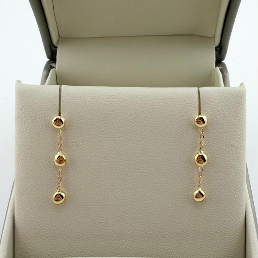 Orecchini pendenti con tre sfere - Oro 18 kt